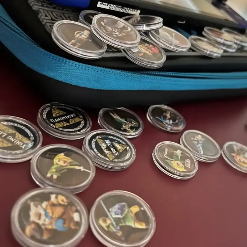 Zelda-Amiibo-Coins-1 Legend of Zelda Amiibo Coins laying on desk